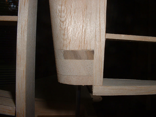Added hardwood thrust blocks to top and bottom of rudder.